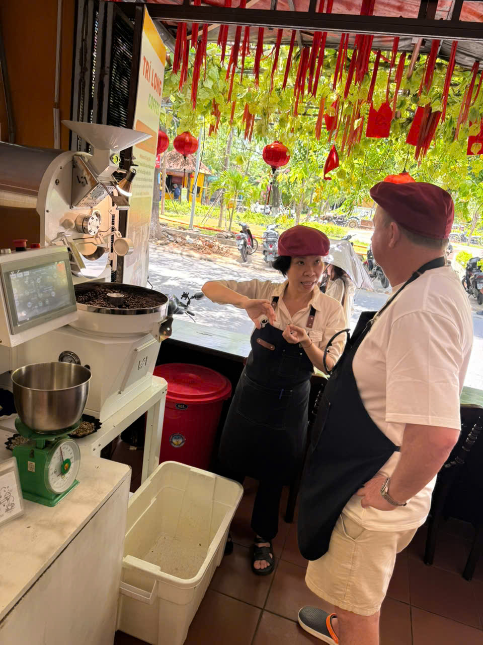 Guests learning Vietnamese coffee roasting at Tri Long Roastery in Hoi An