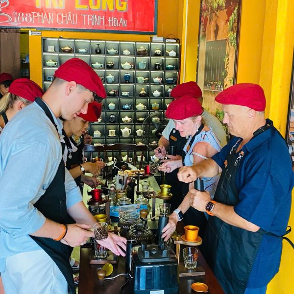 Traveler learning Vietnamese Phin Coffee brewing method