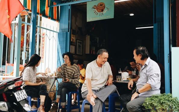 Vietnamese people socializing at a local coffee shop