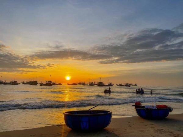 An Bang Beach Hoi An early morning sunrise with local fishing boats