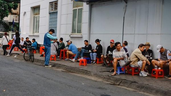 Vietnamese people drinking coffee in everyday life