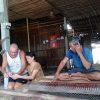 Artisan weaving traditional mats in Hoi An