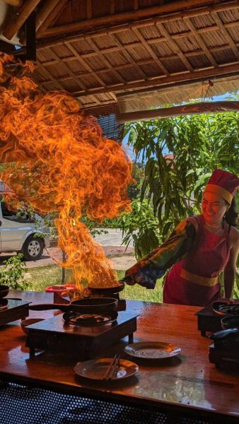 Guests cooking Vietnamese food in a Hoi An cooking class