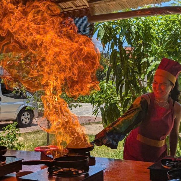 Guests cooking Vietnamese food in a Hoi An cooking class