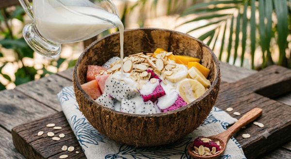 Fresh fruit bowl with yogurt and fresh milk in Hoi An