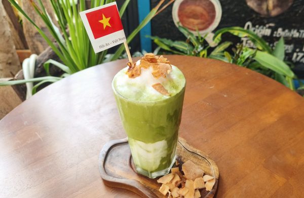 Vietnamese matcha coconut drink served in a glass