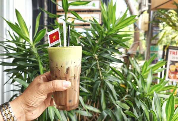Vietnamese matcha cocoa drink served in a glass