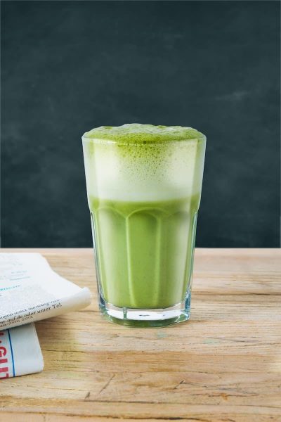 Classic matcha latte served in a glass in Hoi An