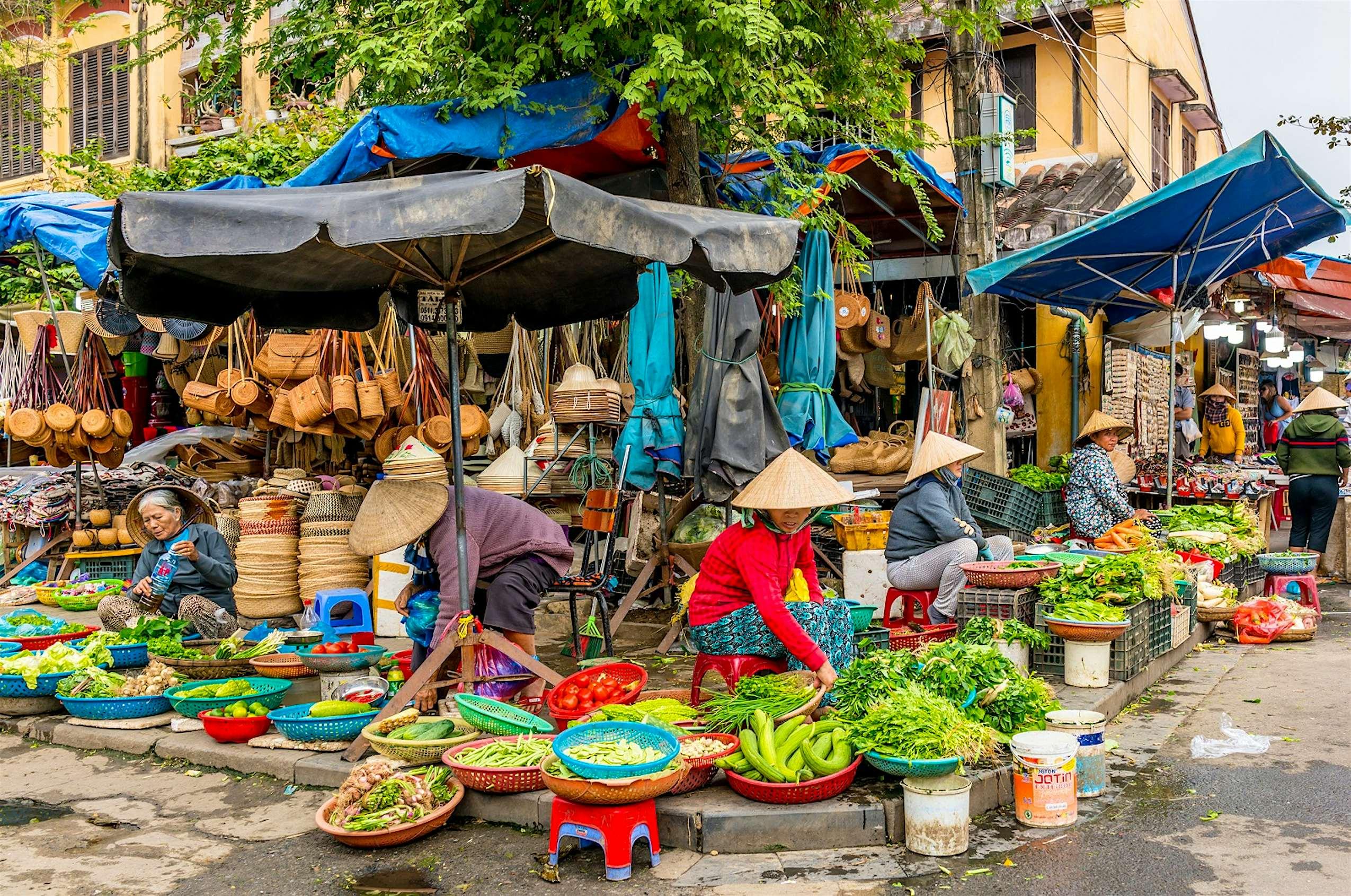 Traditional market in Vietnam with fresh vegetables and local produce